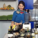 Phebe, with a Vitamix, at work on a production set of The Raw Chef, Russell James, in London.