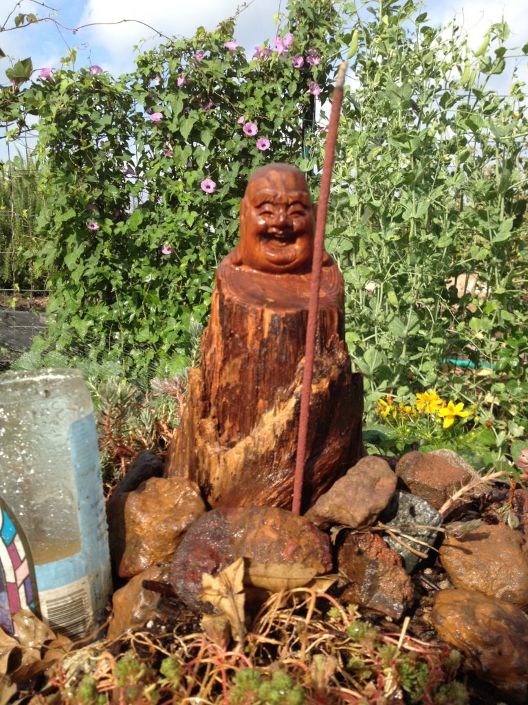 Laughing Buddha in Garden